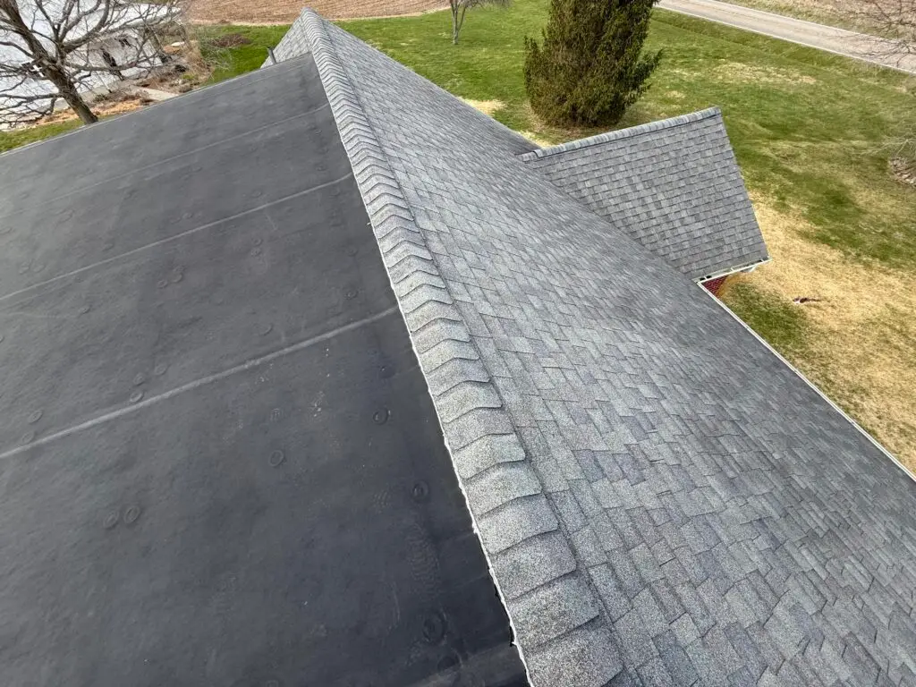 Farmhouse Roof and Siding Renovation in Wingate — flashing installation