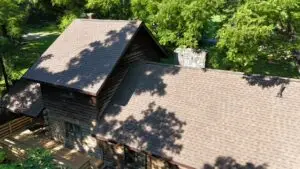 Log Cabin Exterior Restoration in Paragon — sherwin-williams cocoa bean finish